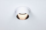 Round recessed spotlight in white metal with warm white light for modern indoor lighting