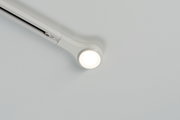 White LED ceiling spotlight made of plastic with round light head for modern indoor lighting