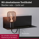 Schwarze Wandlampe mit abnehmbarem Textilkabel und dekorativem LED-Leuchtmittel in DNA-Form