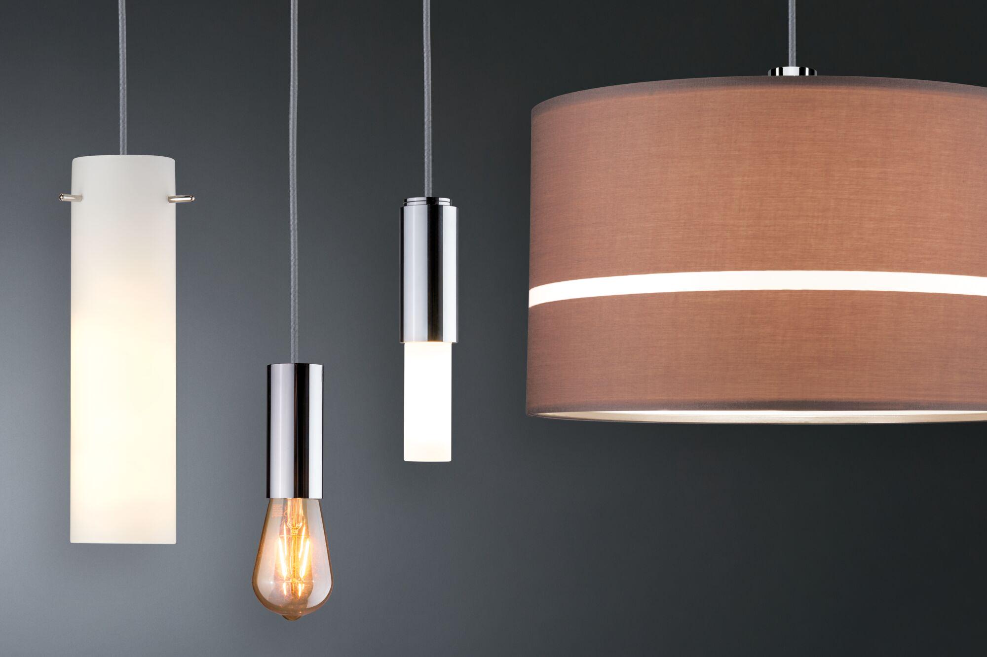 Four modern pendant lights in white, chrome and brown glass and metal for stylish indoor lighting