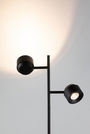 Black metal floor lamp with two adjustable LED spotlights for modern home lighting
