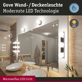 Gove Wand- und Deckenleuchte mit warmweißem LED-Licht in modernem Badezimmer mit Spiegel.