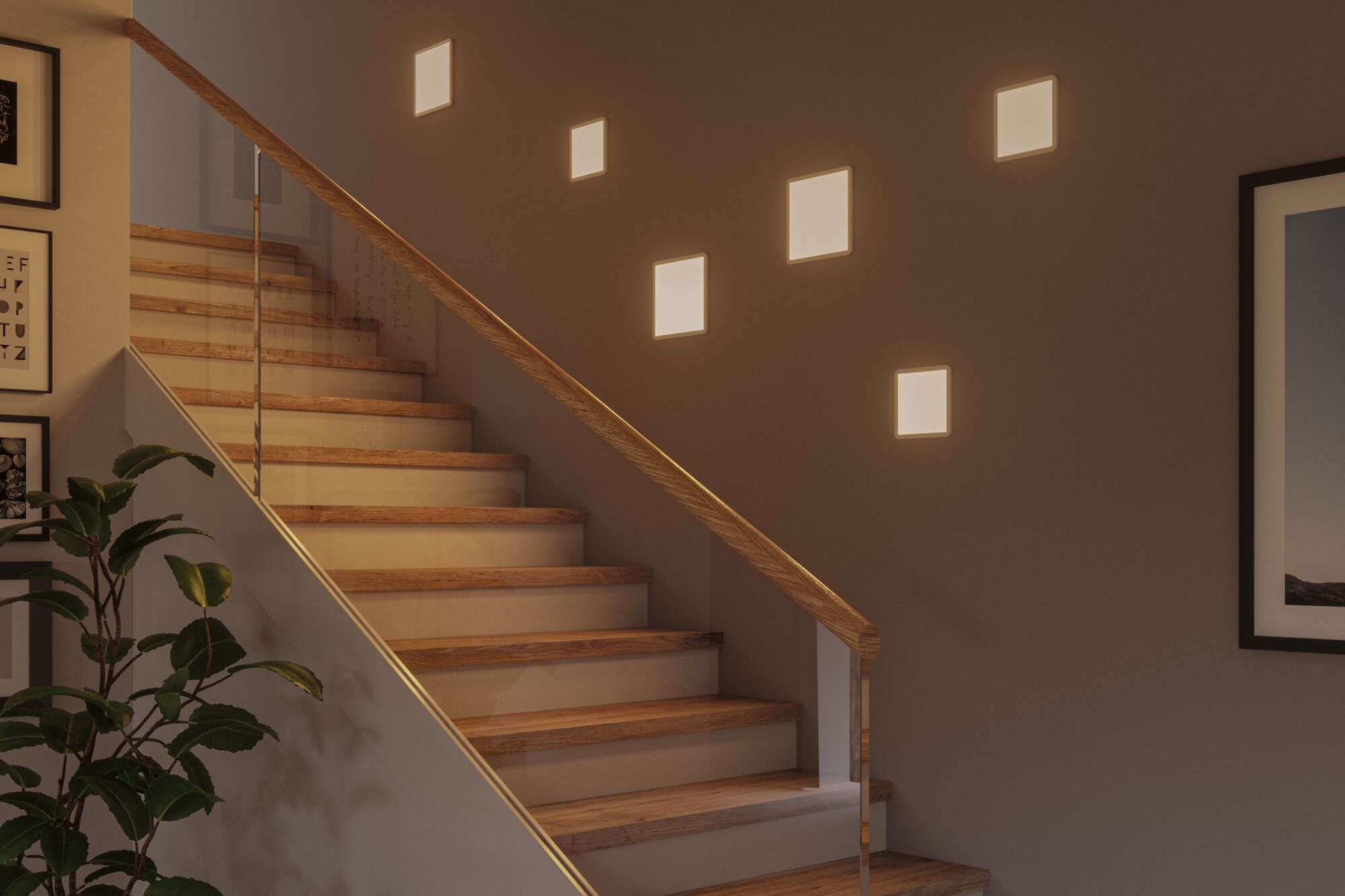 Modern staircase with wooden steps and glass railing lit by warm white square wall lights.