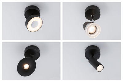 Vier verschiedene schwarze Deckenstrahler aus Metall mit LED-Beleuchtung für moderne Innenräume