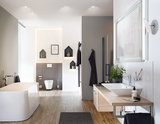Modern bathroom with freestanding white bathtub, wood-look floor, and LED-lit wall shelves for ambient lighting