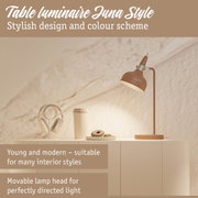 Brown metal table lamp with adjustable head for focused lighting in modern interior design