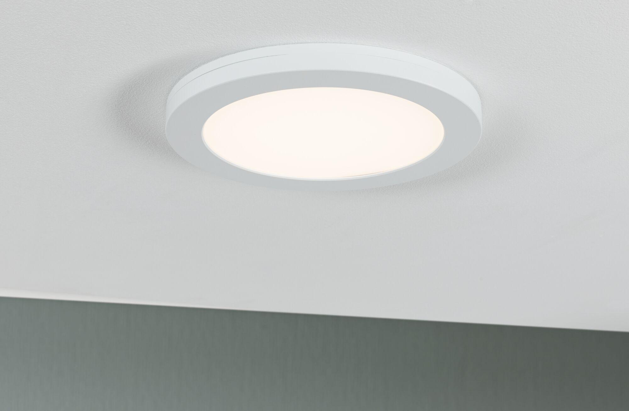 Round white LED ceiling light with warm white glow for modern interior lighting