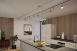 Moderne keuken met witte kasten, houten panelen, grijs werkblad en LED-railverlichting.