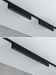 Schwarze LED-Schiene mit linearen Leuchten an weißer Decke für moderne Innenbeleuchtung