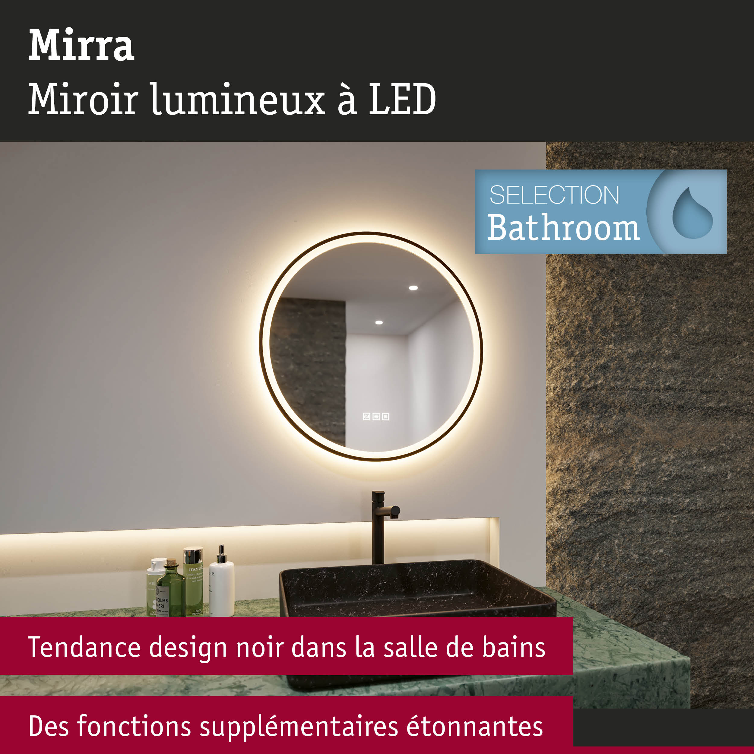 Miroir LED rond avec lumière chaude et vasque noire sur marbre vert dans une salle de bains moderne