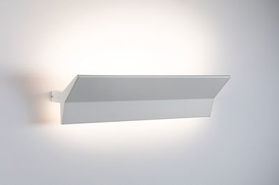 Modern white aluminum wall light with indirect lighting for stylish room illumination
