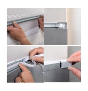 Installation of white LED strip in aluminium profile on grey wall showing connection details