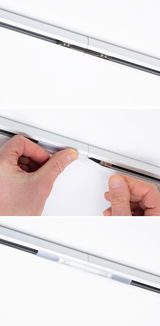 White track system with metal connector and transparent cover profile for LED lighting setup