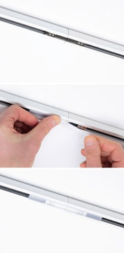 White track system with metal connector and transparent cover profile for LED lighting setup