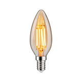 LED candle-shaped bulb with warm white light and clear glass for decorative lighting use