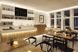 Modern café met hout- en witte elementen, warme LED-verlichting en stijlvolle bar met koffiemachine.