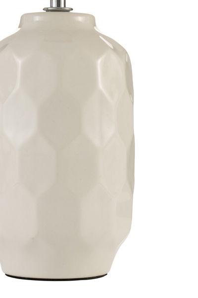 White ceramic table lamp with hexagonal pattern and metal fitting for home lighting