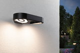 Schwarze LED-Außenwandleuchte mit rundem Lichtdesign aus Metall, moderne Gartenbeleuchtung für Hauswand.