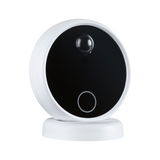 Round white smart home device with black front and sensor module for light control