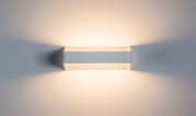 Modern white metal LED wall light with warm white illumination and decorative light effect