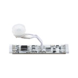 White LED motion sensor with transparent plastic housing and wires for lighting control