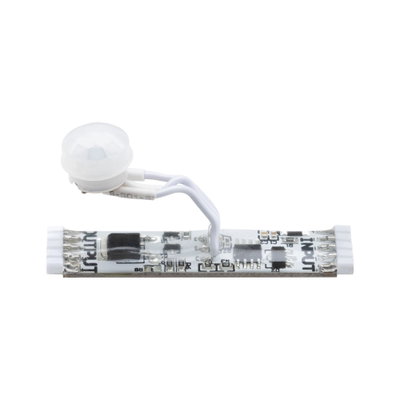 White LED motion sensor with transparent plastic housing and wires for lighting control