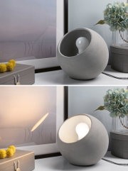 Runde Tischlampe aus grauem Beton mit sichtbarer Glühbirne, modernes Wohnaccessoire für stimmungsvolle Beleuchtung