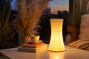 Ceramic table lamp with warm white light and decorative dot pattern for cozy home lighting