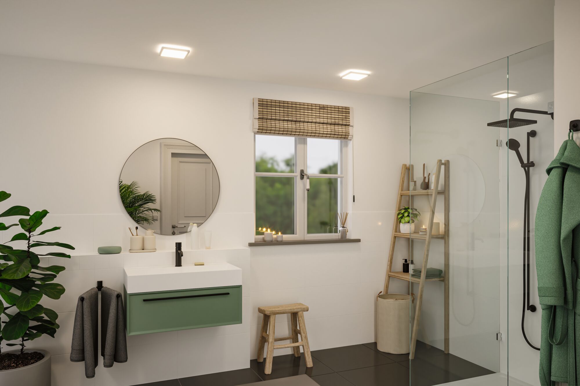 Moderne badkamer met groene wastafelkast, ronde spiegel en zwarte douchearmaturen in lichte ruimte