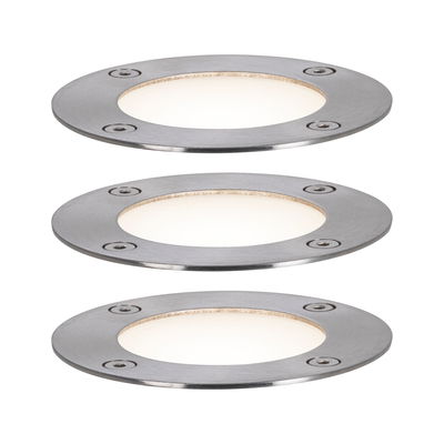 Three round brushed stainless steel LED recessed lights with warm white light for outdoor use