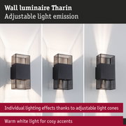 Black metal Tharin wall luminaire with adjustable light cones and warm white light for cozy accents