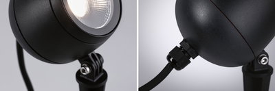Black metal LED outdoor spotlight with adjustable head and weatherproof cable connection for garden lighting