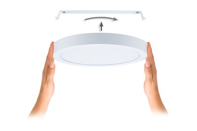 White round LED ceiling light in plastic with mounting bracket and hands showing installation