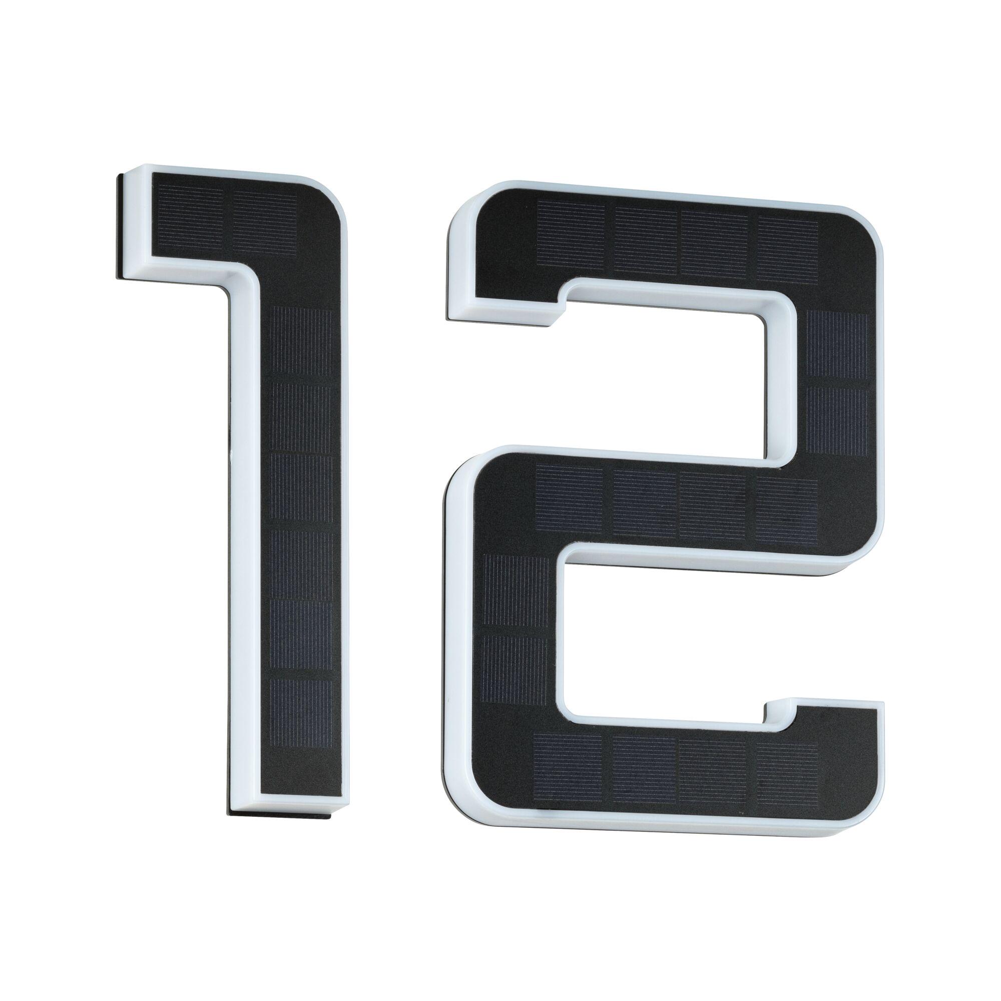 White LED house number with black solar panels for energy-efficient outdoor lighting