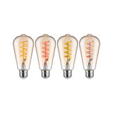 Four vintage LED bulbs with colored spiral filaments in amber glass for decorative lighting