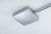 Matte silver aluminium ceiling light with rounded edges and track system for modern interior lighting