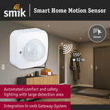White smart home motion sensor with 150° detection angle and 12 m range for automated safety and comfort