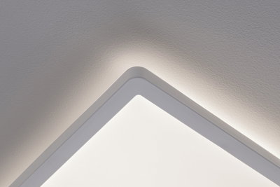 Square white LED ceiling light with indirect lighting for modern room ambiance
