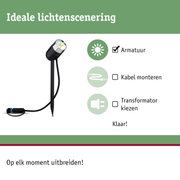 Zwarte LED-tuinschijnwerper met grondpen en kabel voor flexibele buitenverlichting.