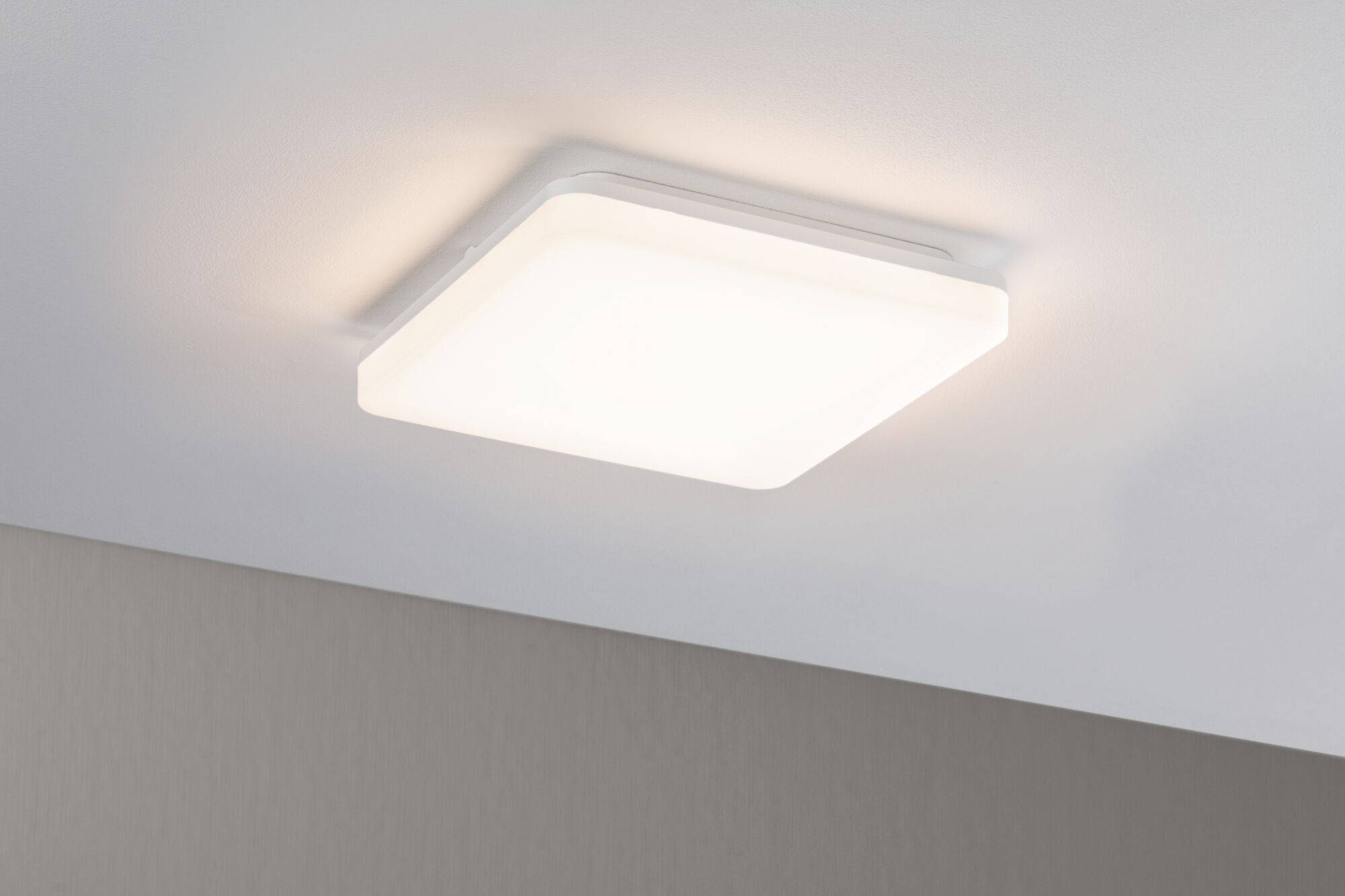 Square white ceiling light made of plastic with warm white LED light for living spaces