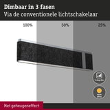 Dimbare zwarte LED-wandlamp met vilten oppervlak en warm wit licht in drie helderheidsniveaus