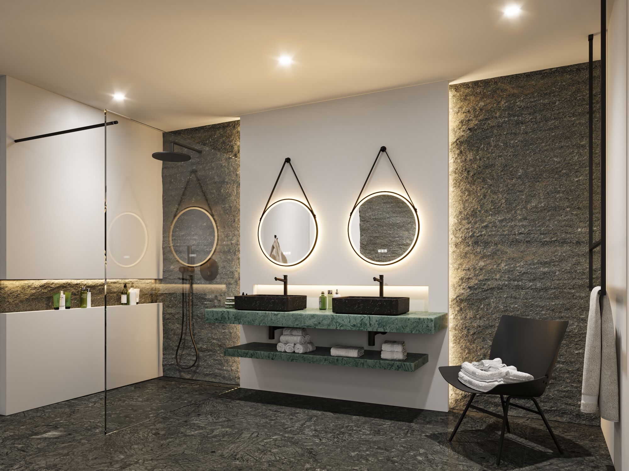 Modernes Badezimmer mit grüner Marmor-Waschtischplatte, schwarzen Waschbecken und runden LED-Spiegeln.