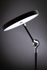Moderne zwarte LED-vloerlamp met ronde lichtkop en verstelbare metalen en kunststof arm