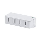 White plastic distribution box with four slots and green indicator light for electrical connections
