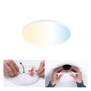 Round white LED ceiling light with adjustable warm to cool white tone, shown in installation steps.