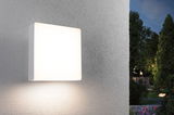 Square white outdoor wall light made of plastic with warm white light for garden and terrace