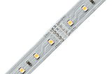 Close-up of silver LED strip with yellow LEDs and 24V markings for lighting applications.