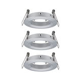 Trois cadres encastrés ronds en aluminium brossé argenté pour spots LED au plafond
