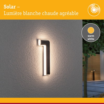 Numéro de maison solaire 1 avec lumière blanche chaude sur mur gris pour éclairage extérieur