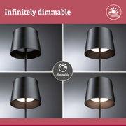 Black dimmable floor lamp with cylindrical metal shade and smooth brightness control